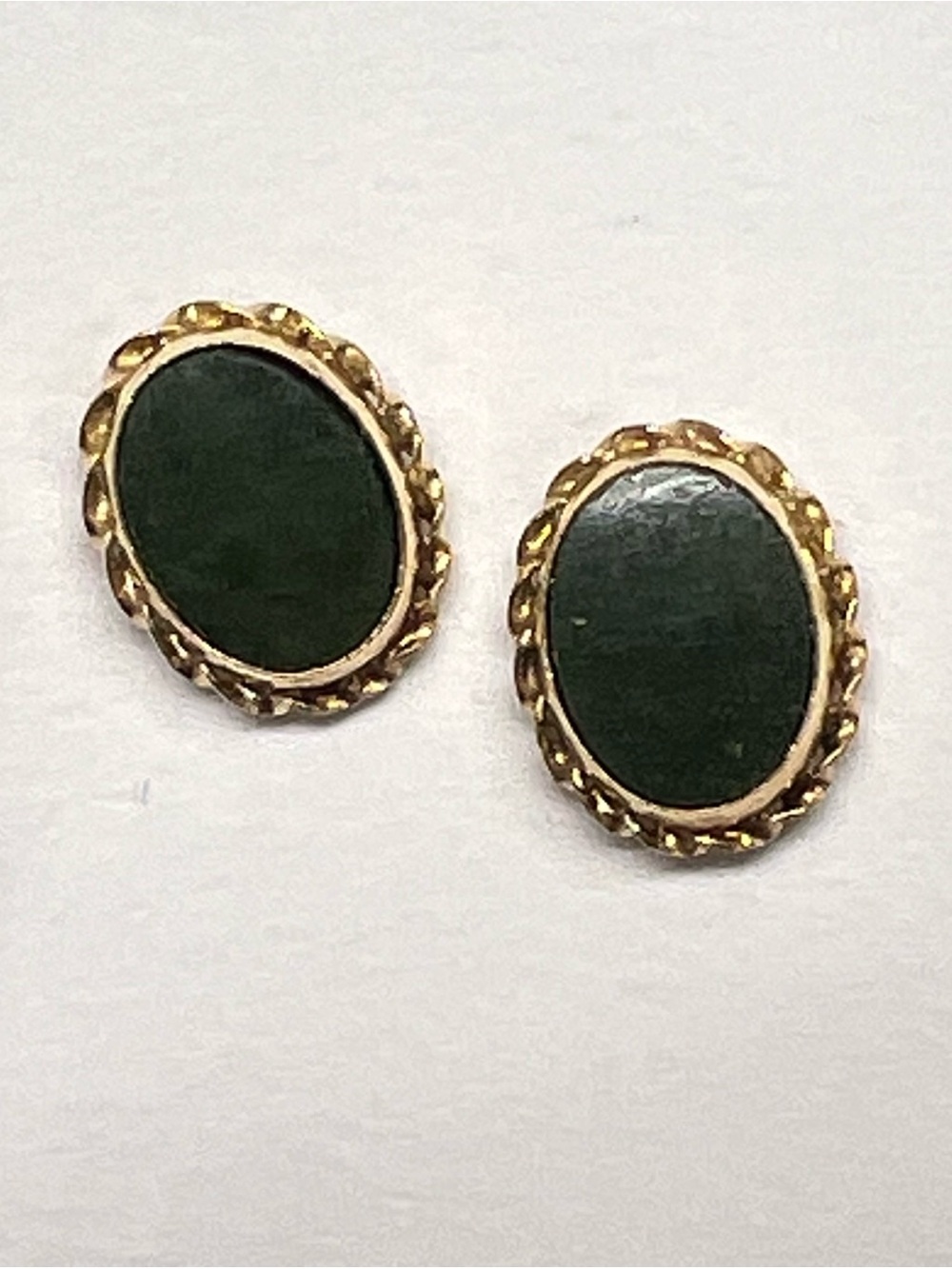14 Karat gold emerald stud earrings